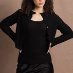 a cashmere lace cardigan sweater in black  with black silk skirt