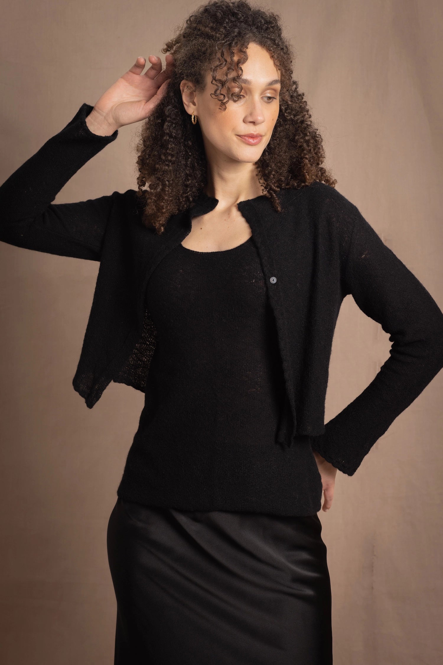 a cashmere lace cardigan sweater in black  with black silk skirt