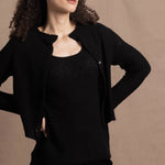 a cashmere lace cardigan sweater in black  with black silk skirt