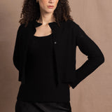 a cashmere lace cardigan sweater in black  with black silk skirt