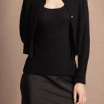 a cashmere lace cardigan sweater in black  with black silk skirt