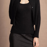 a cashmere lace cardigan sweater in black  with black silk skirt
