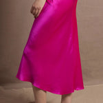 A 100% silk skirt in bright shocking pink