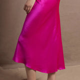 A 100% silk skirt in bright shocking pink
