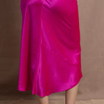A 100% silk skirt in bright shocking pink