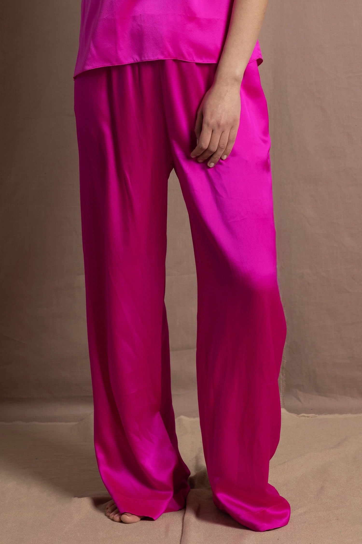 Pure silk 100% trousers in a bright pink colour