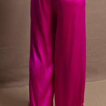 Pure silk 100% trousers in a bright pink colour