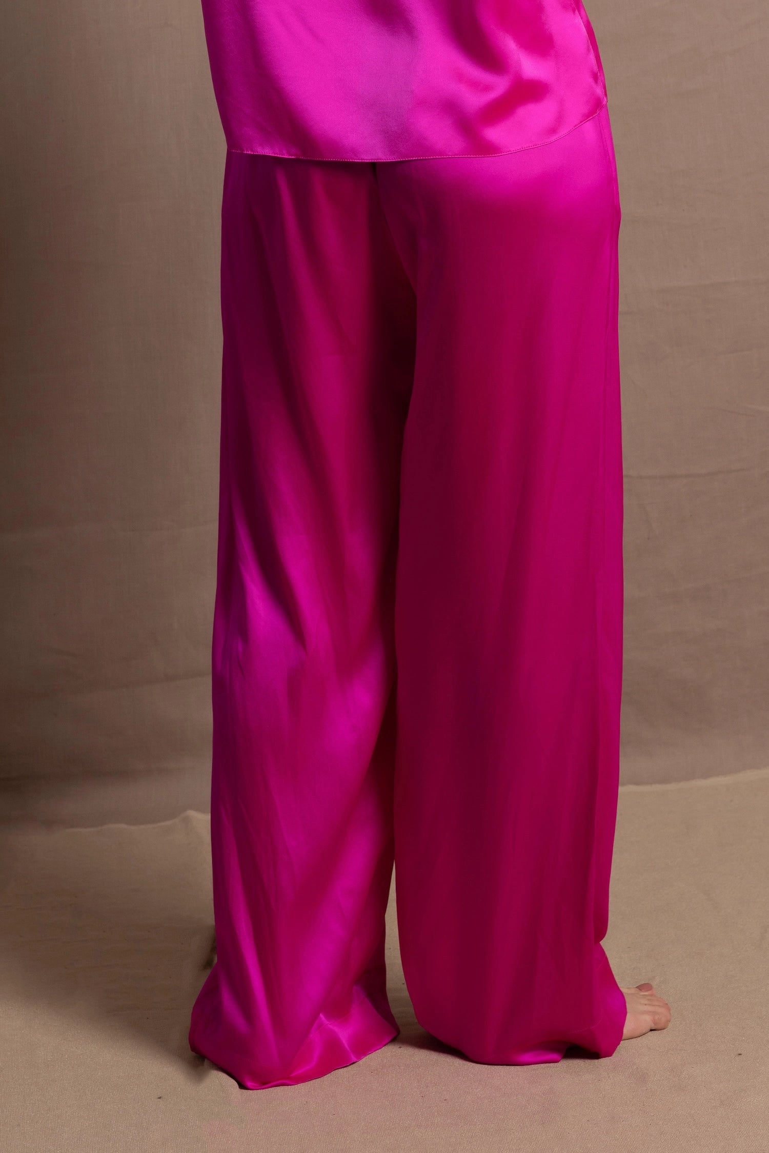 Pure silk 100% trousers in a bright pink colour