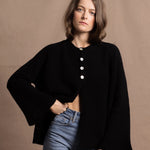 a 100% cashmere button down swing cardigan with moss stitch texture in black