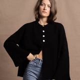 a 100% cashmere button down swing cardigan with moss stitch texture in black
