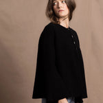 a 100% cashmere button down swing cardigan with moss stitch texture in black