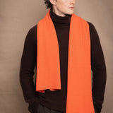 Man wearing an orange cashmere fisherman scarf