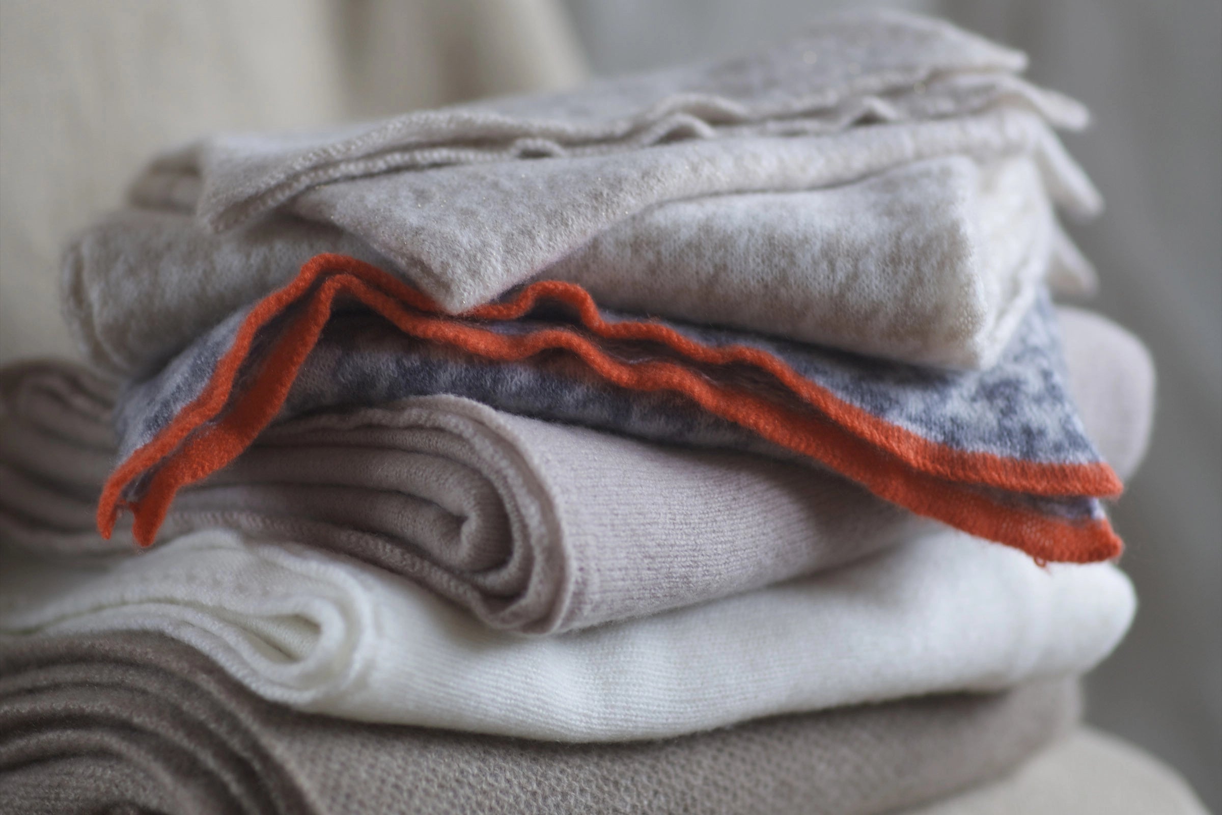 pile of luxury cashmere scarves