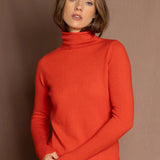 luxury cashmere turtleneck sweater in orange