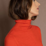 luxury cashmere turtleneck sweater in orange