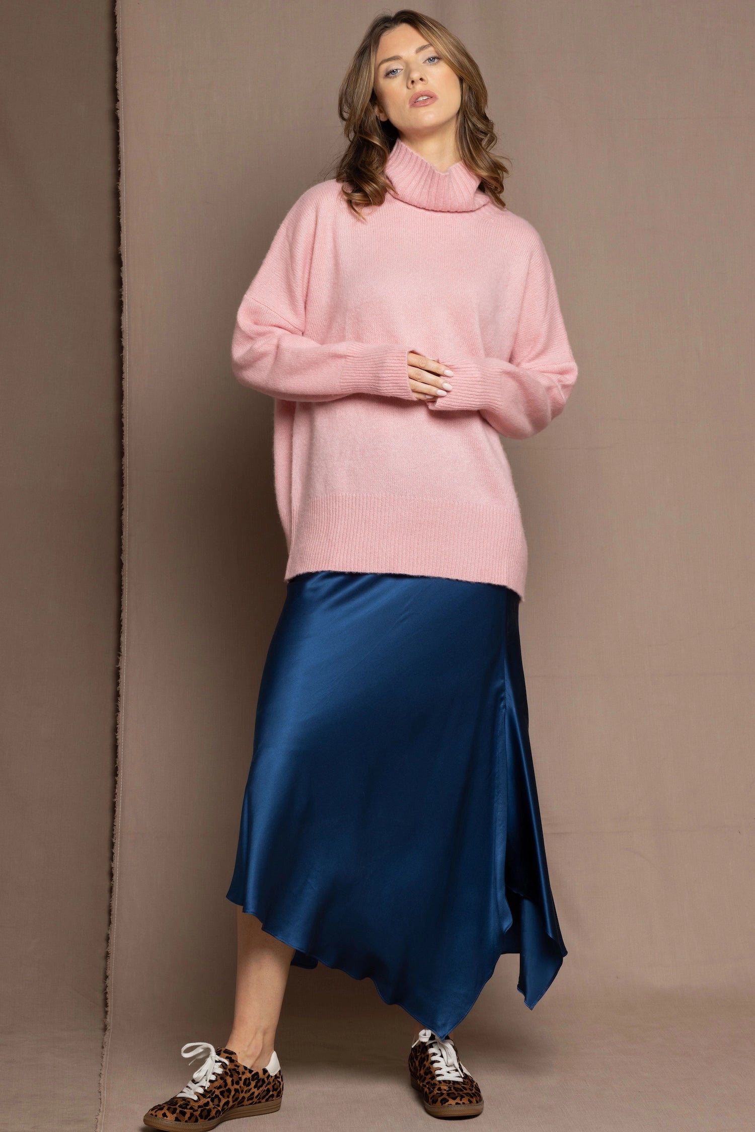 cashmere sweater in pink and blue silk skirt