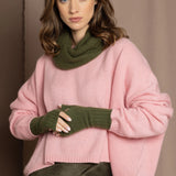 cashmere snood in green with matching green gloves and pink sweater