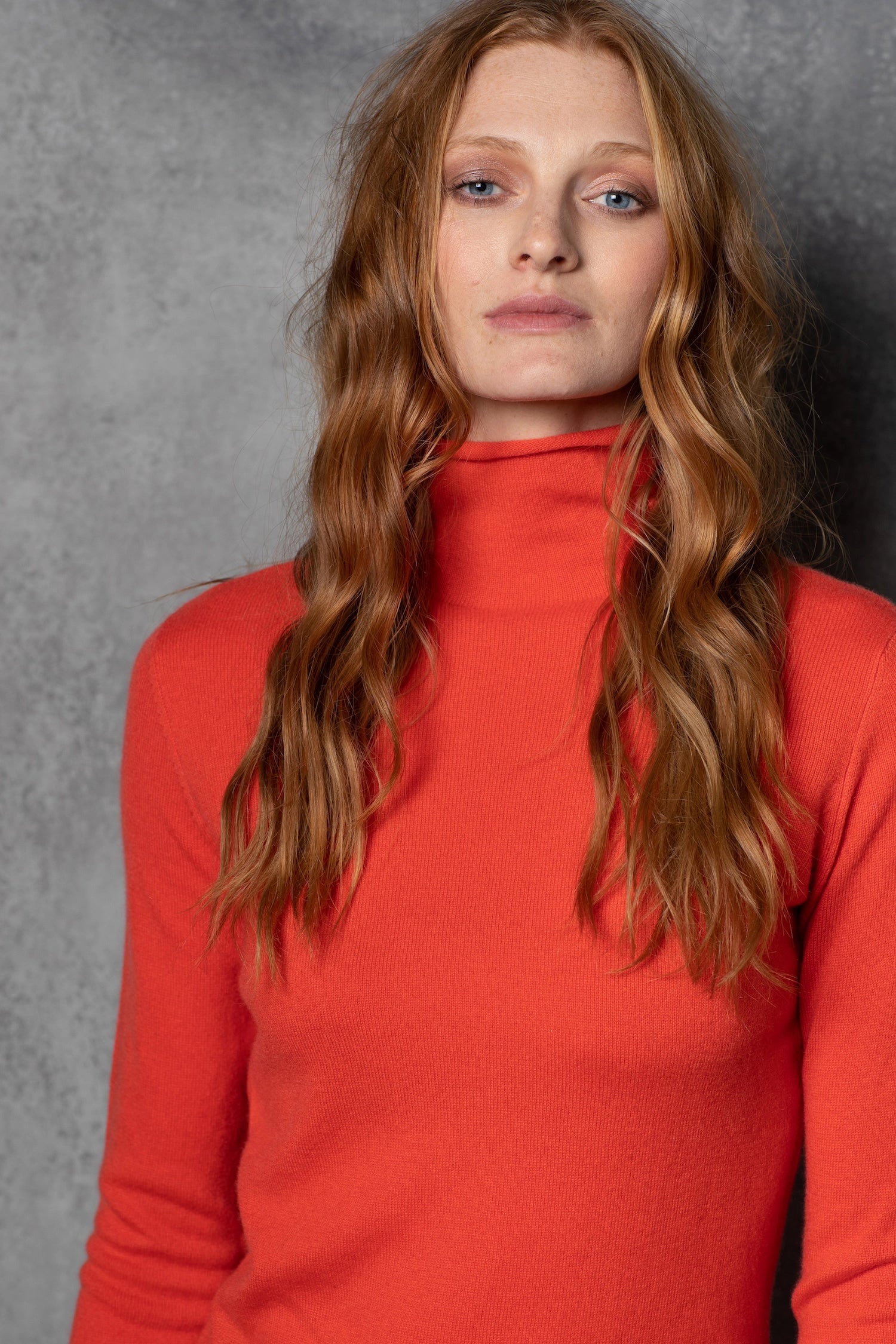 luxury cashmere turtleneck sweater in orange