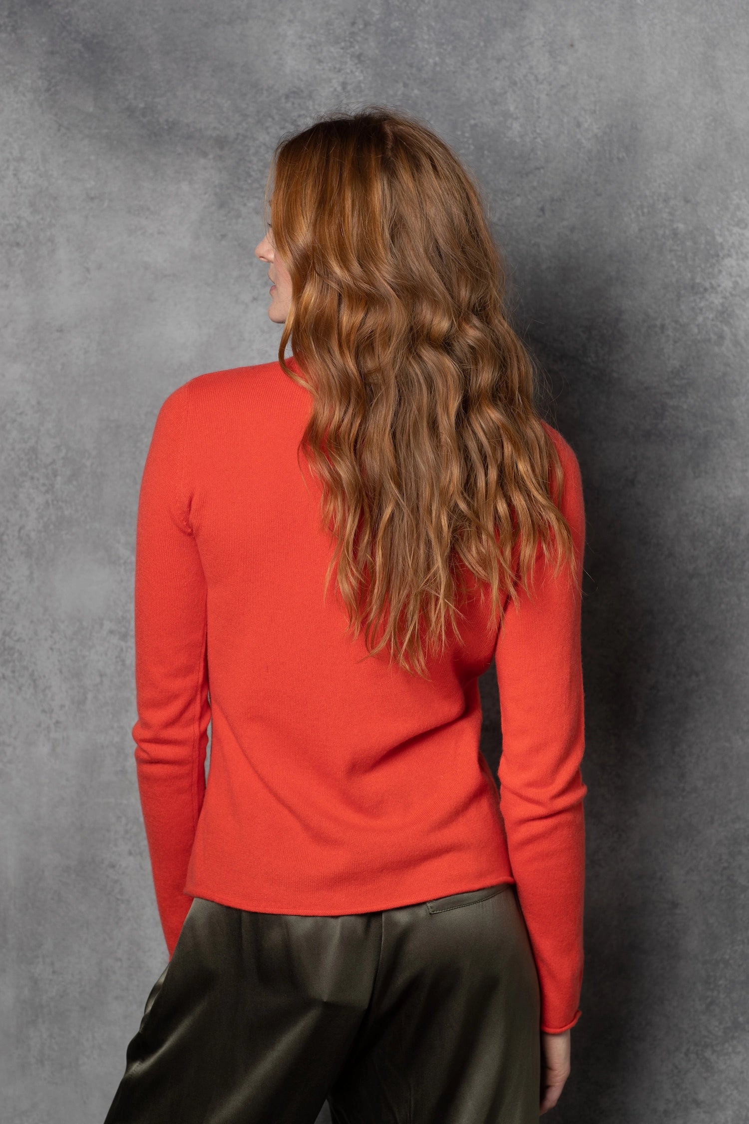 luxury cashmere turtleneck sweater in orange