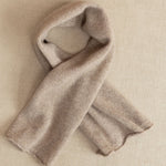 a small beige cashmere scarf 
