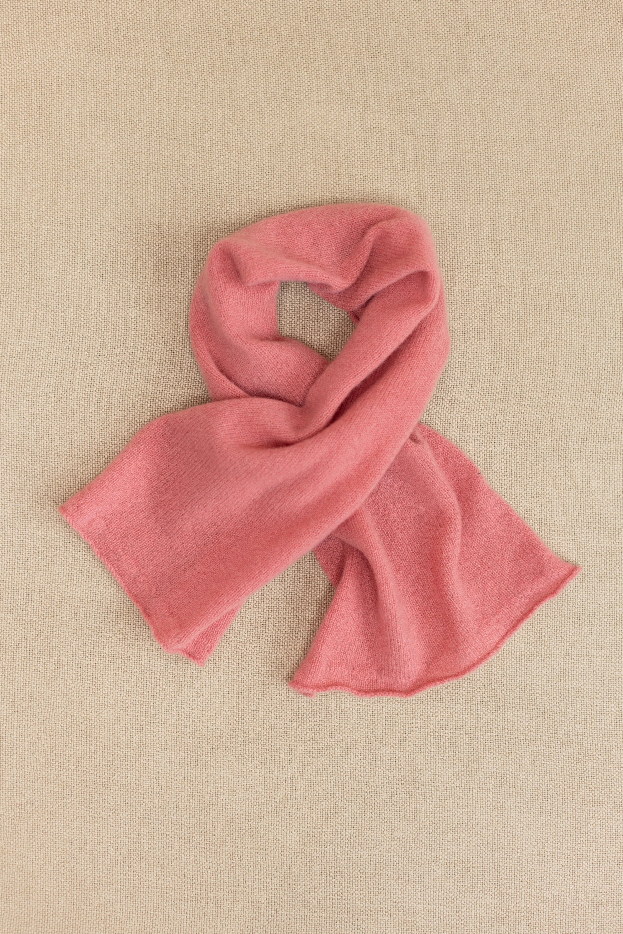a small dusty pink cashmere scarf 