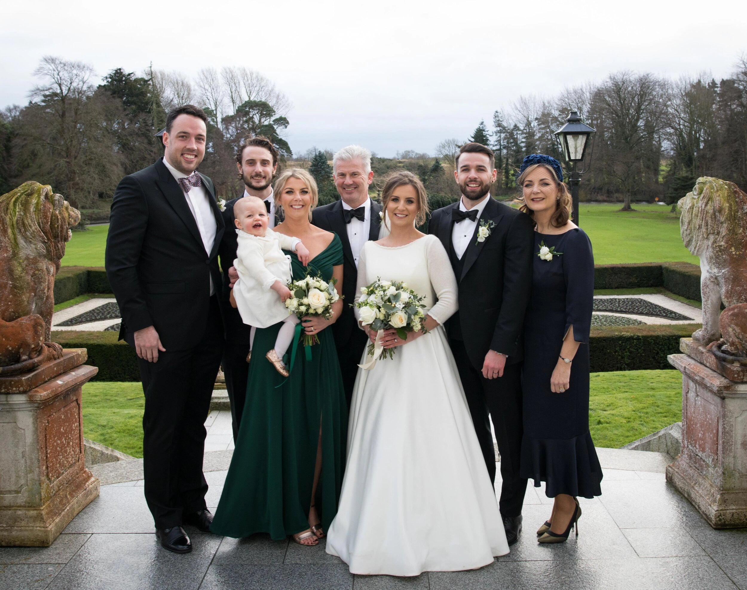 Emma Madigan and the Madigan family on their wedding day