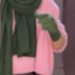 cashmere sweater in pink with green silk trousers and green cashmere scarf and gloves