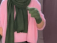 cashmere sweater in pink with green silk trousers and green cashmere scarf and gloves