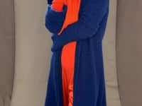 cashmere scarf and gloves in orange with bright blue cashmere coat