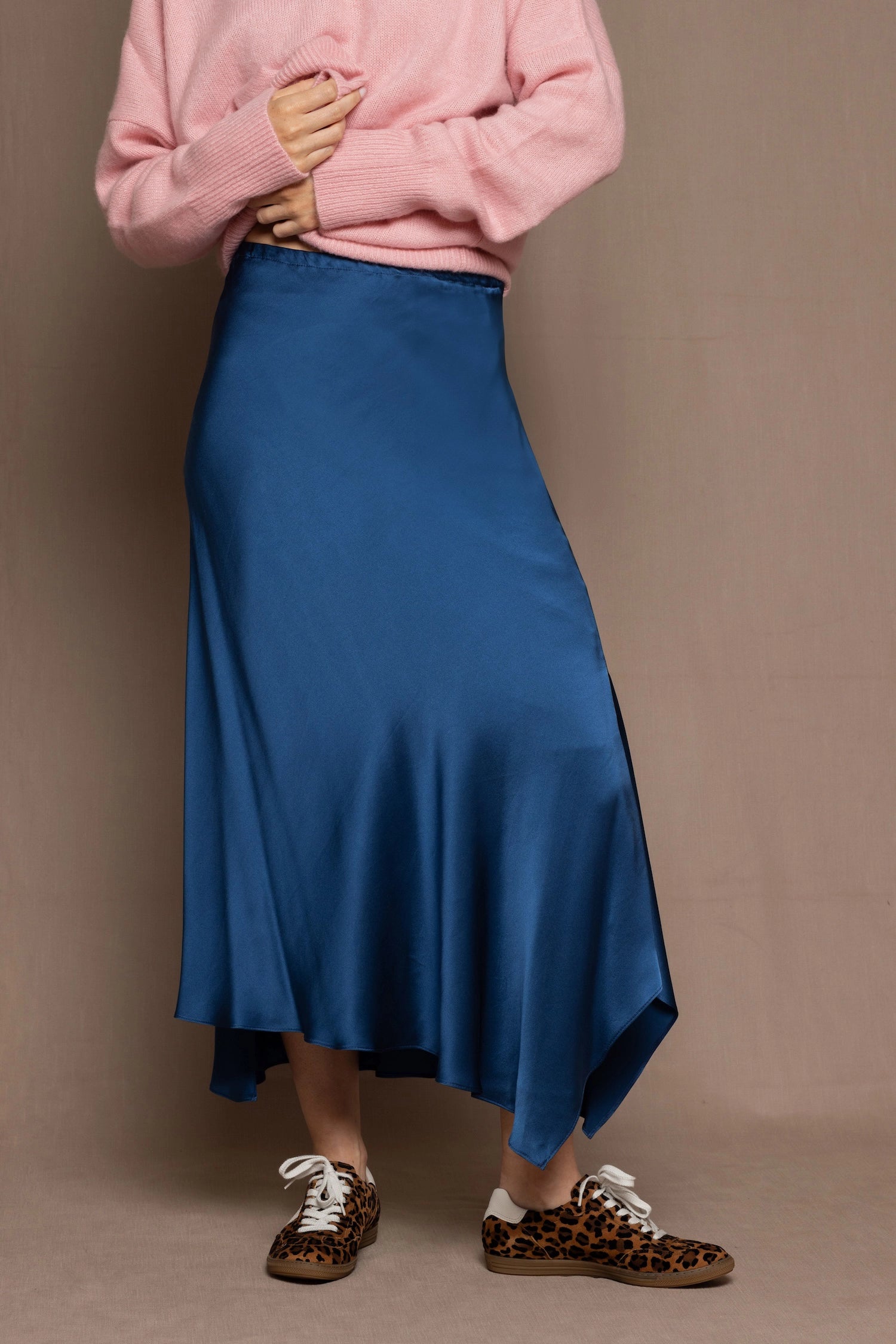 asymmetrical silk skirt in teal blue