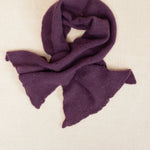 a small purple cashmere scarf 