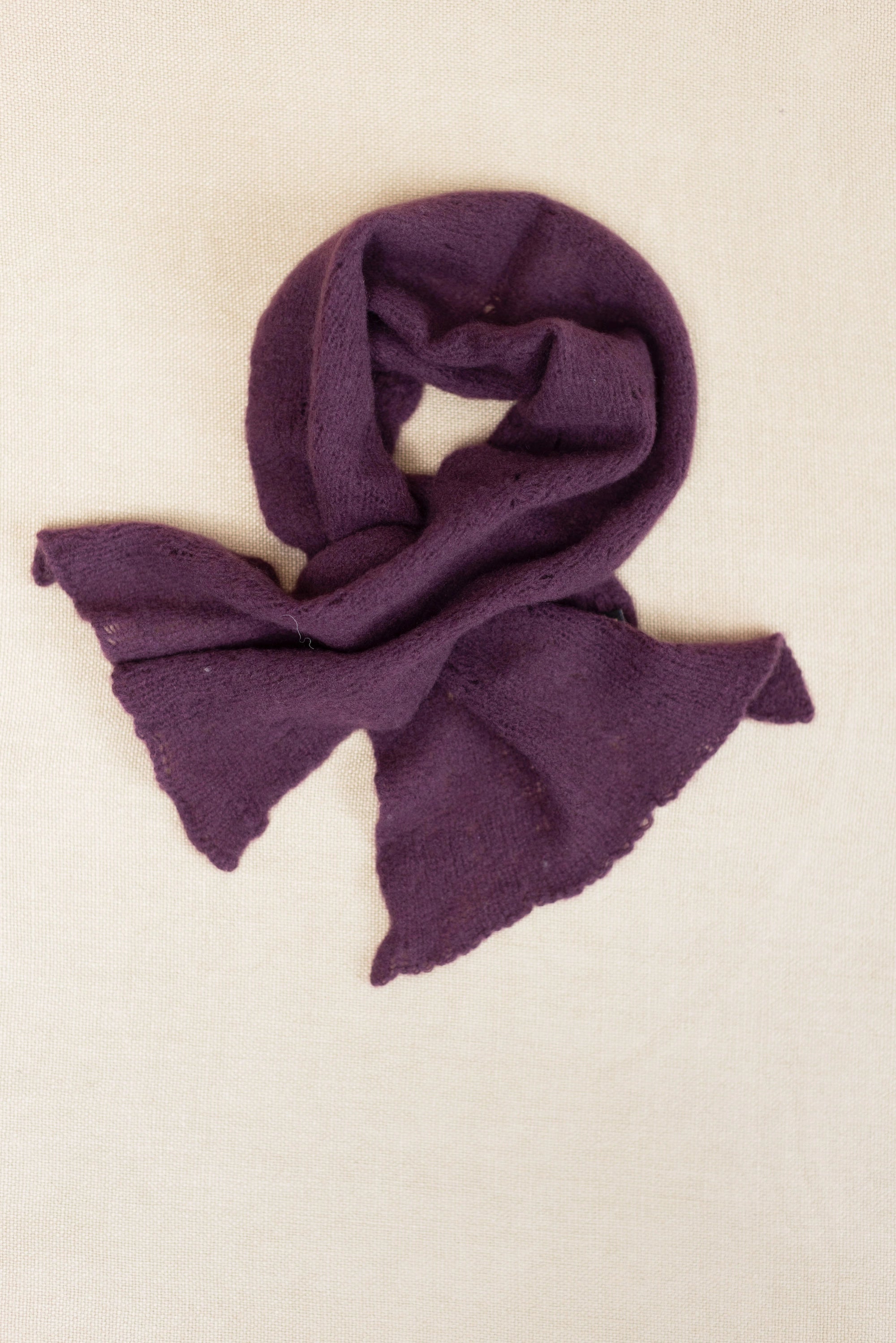 a small purple cashmere scarf 