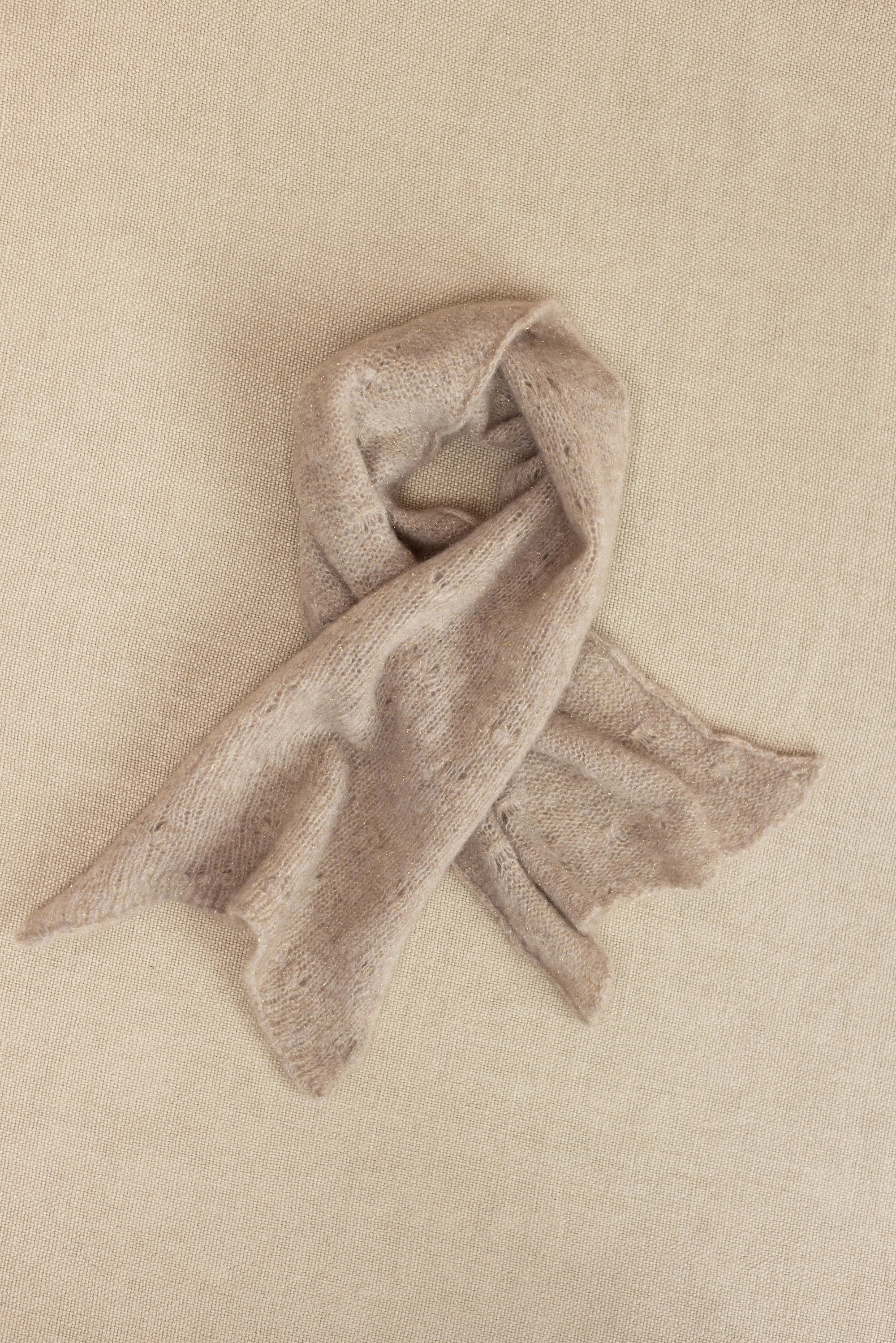 a small beige lace cashmere scarf 