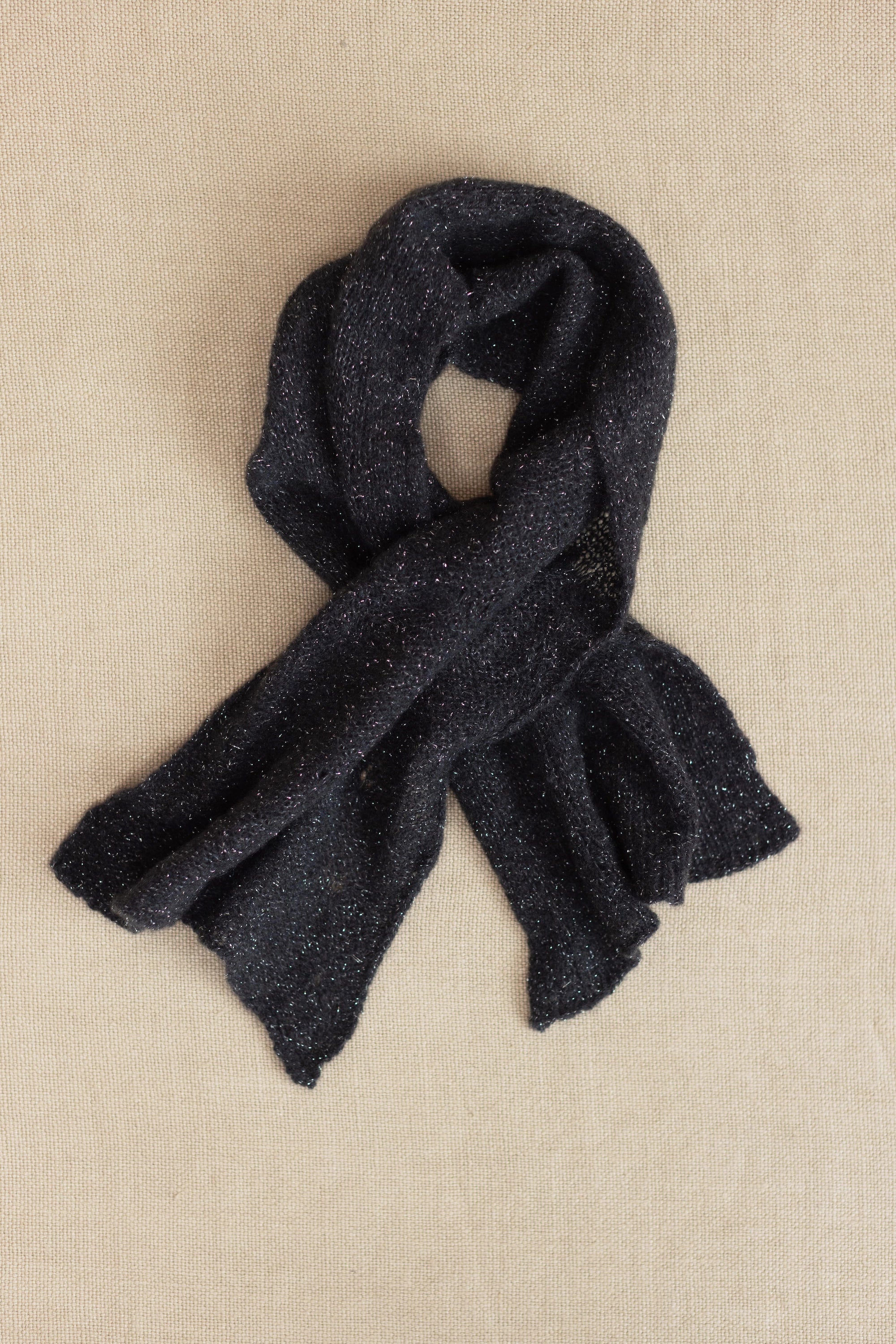 a small black and silver cashmere scarf 