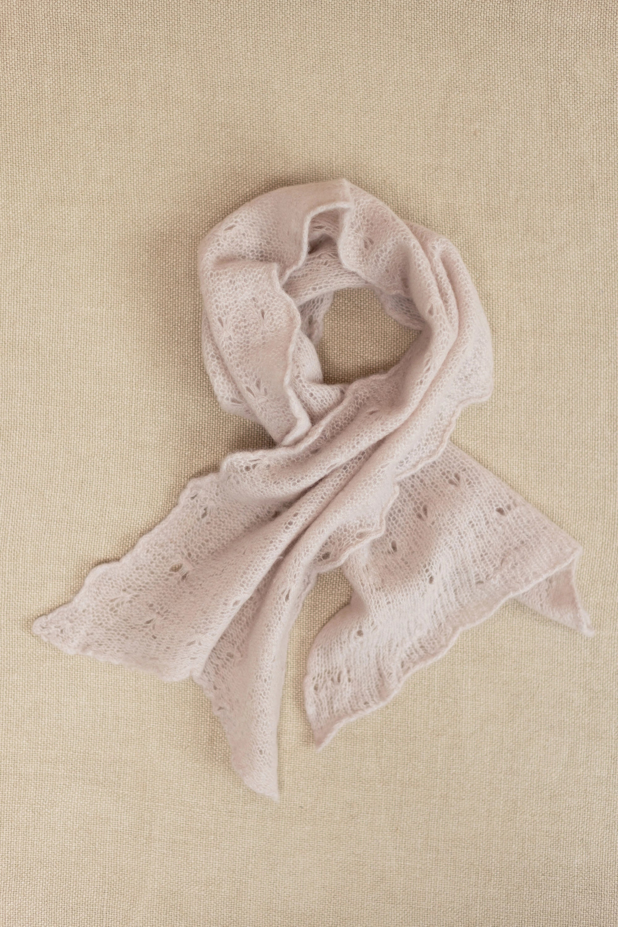 a small beige lace cashmere scarf 