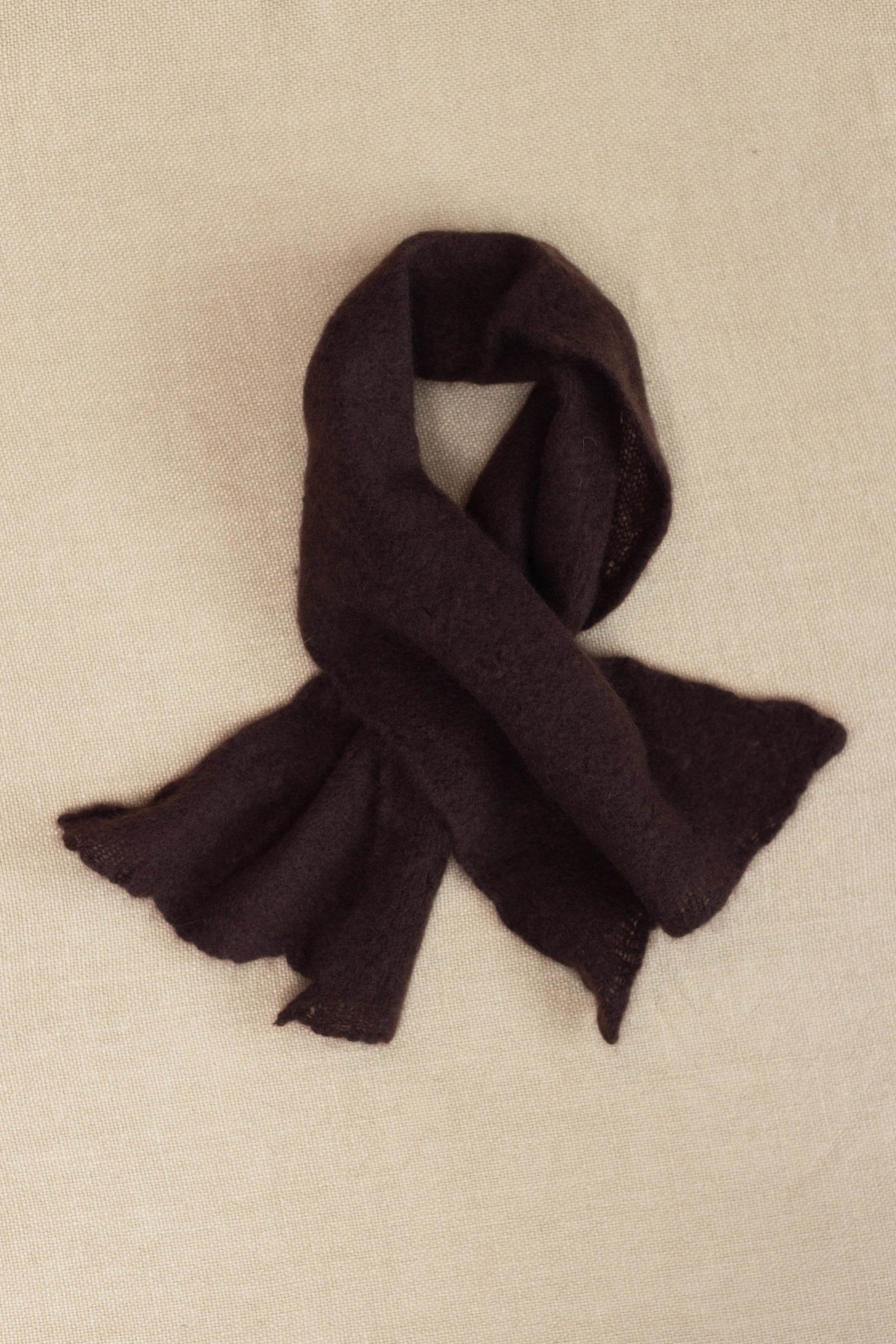 a small brown lace cashmere scarf 